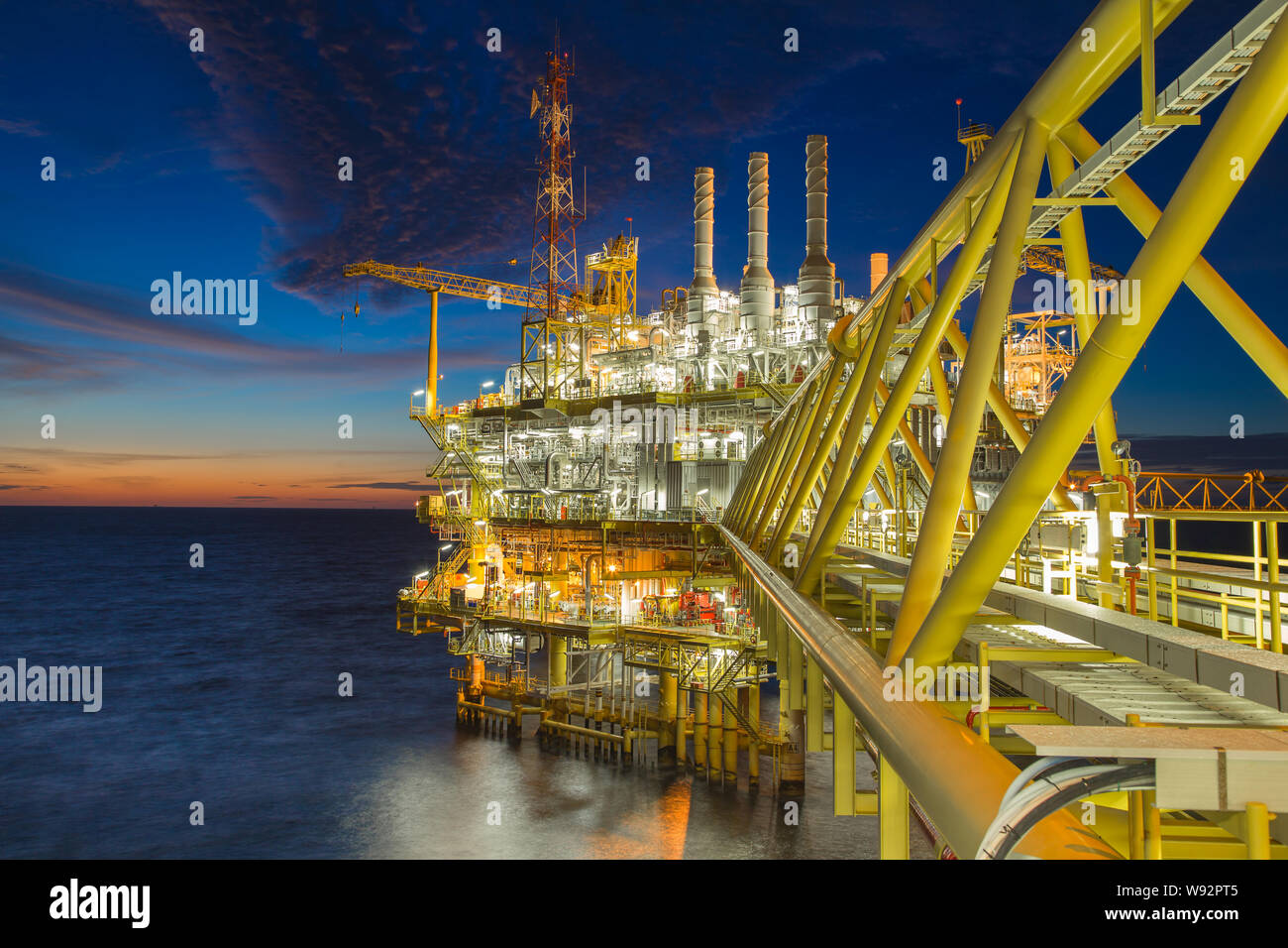 Origin of world energy and pretochemical,Oil and gas processing platform produced gas and crud oil condensate and sent to onshore refinery. Stock Photo