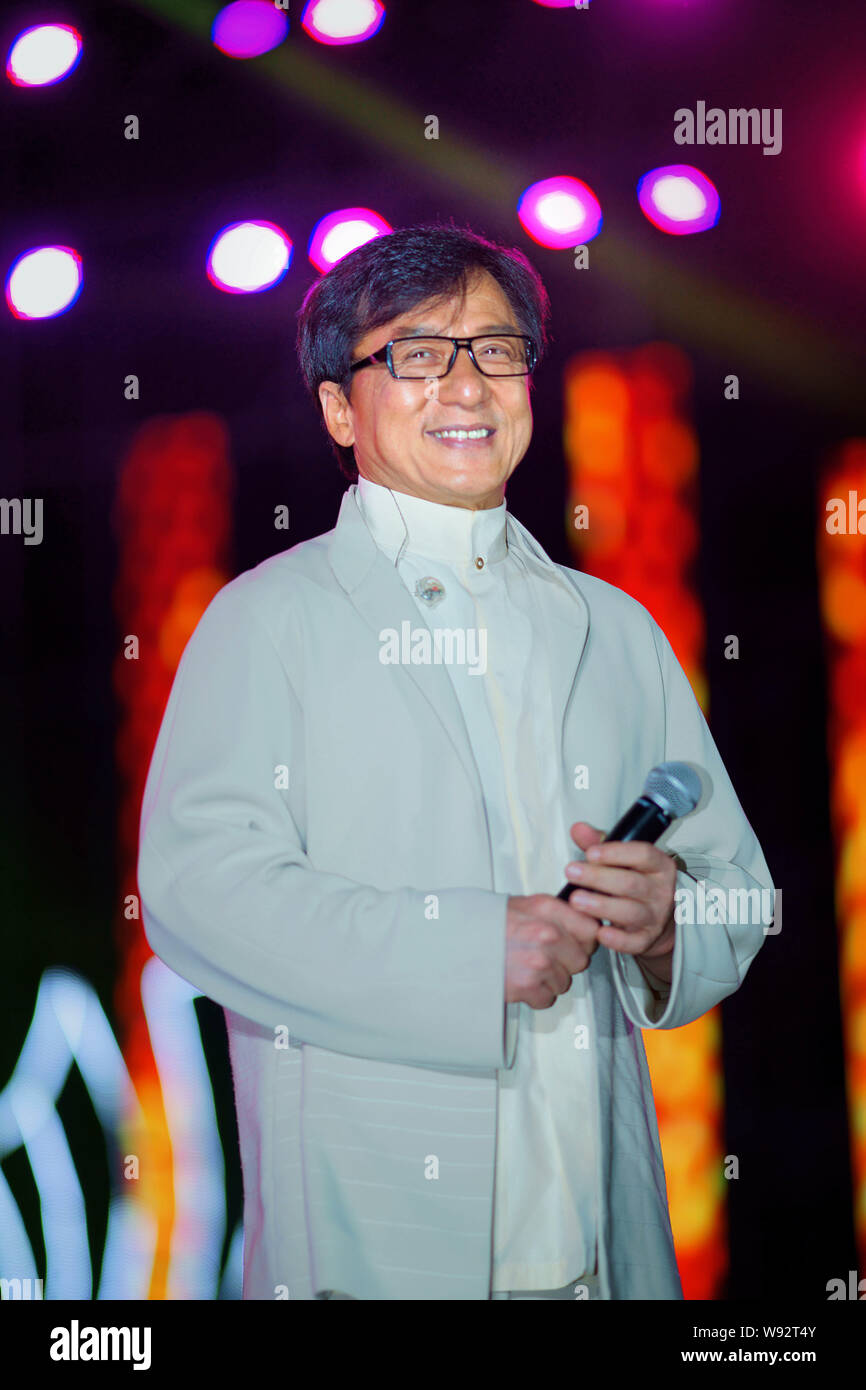 Hong Kong singer and actor Jackie Chan smiles during a group star