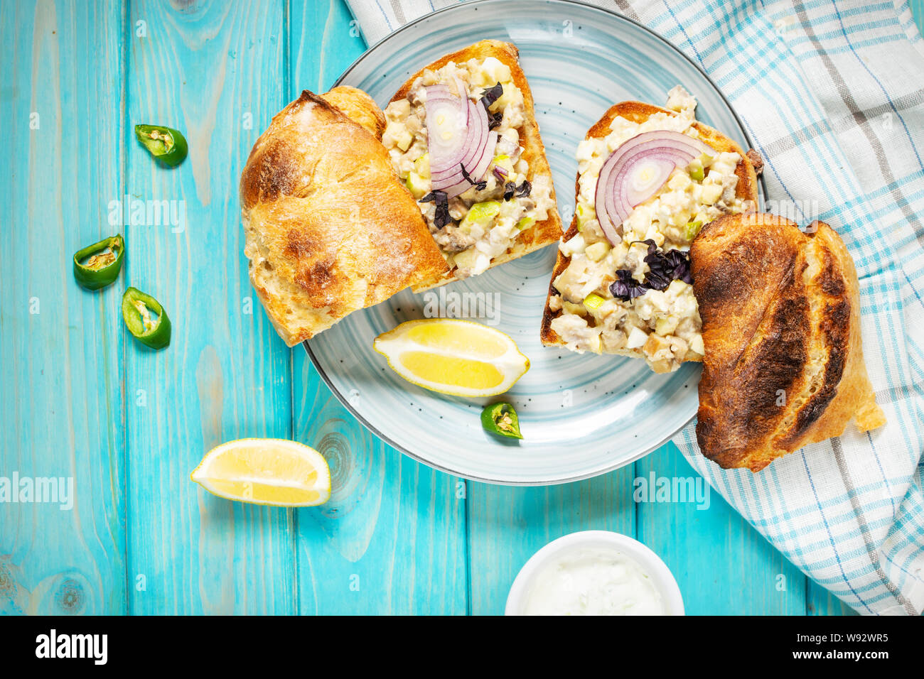 Fish pate, minced herring fillet with apple and egg on toasted rye ...