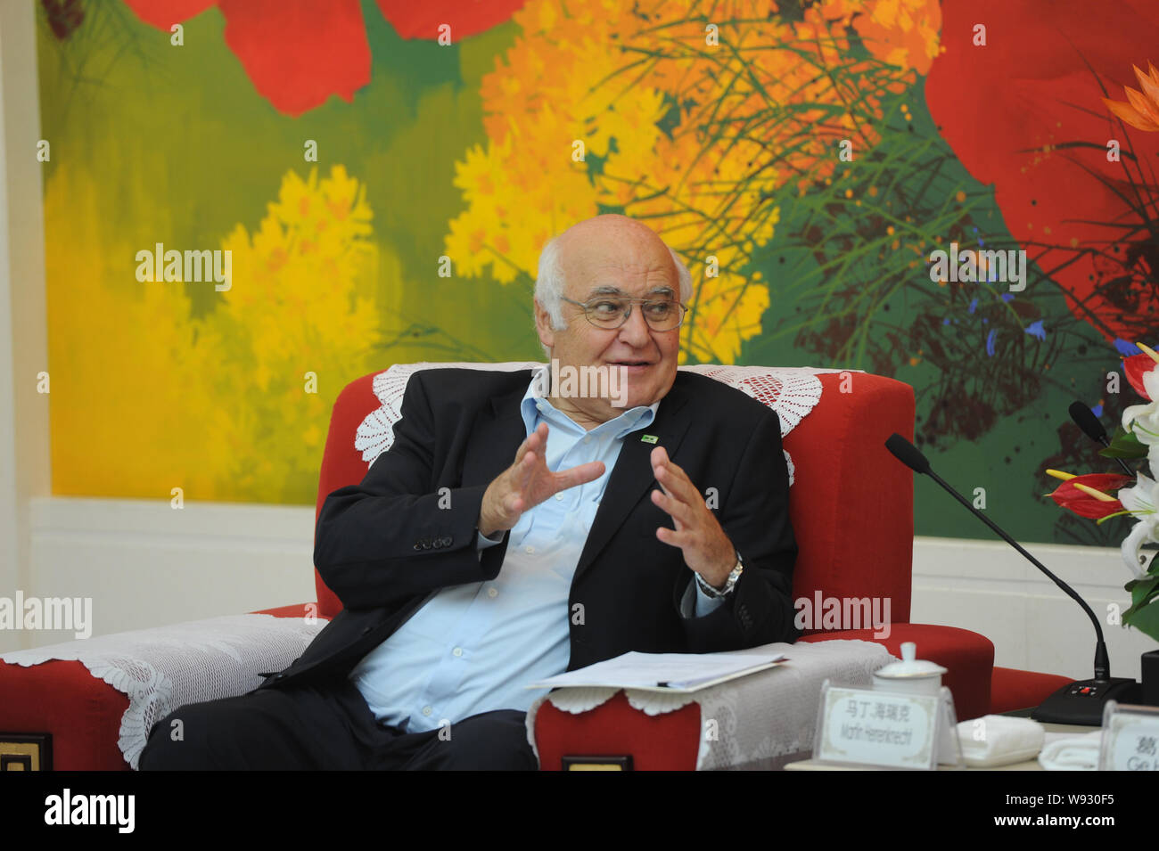 Martin Herrenknecht, Founder and CEO of Herrenknecht AG, the German manufacturer of tunnel boring machines, speaks during a meeting with Ge Honglin, c Stock Photo