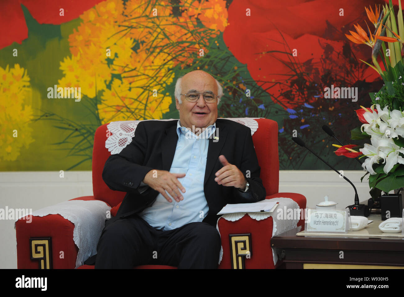 Martin Herrenknecht, Founder and CEO of Herrenknecht AG, the German manufacturer of tunnel boring machines, speaks during a meeting with Ge Honglin, c Stock Photo
