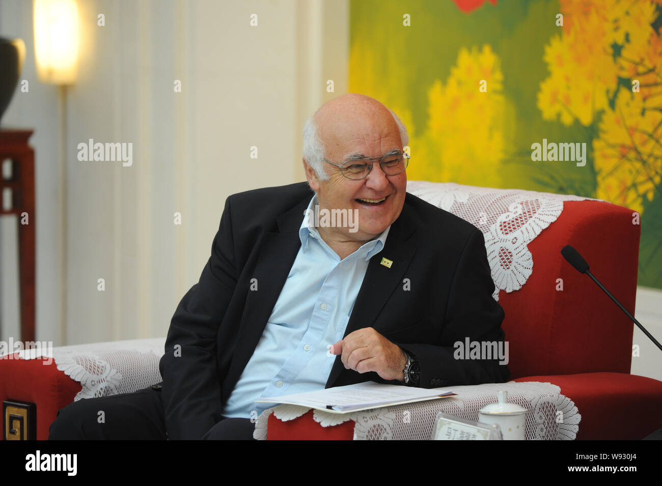 Martin Herrenknecht, Founder and CEO of Herrenknecht AG, the German manufacturer of tunnel boring machines, smiles during a meeting with Ge Honglin, c Stock Photo