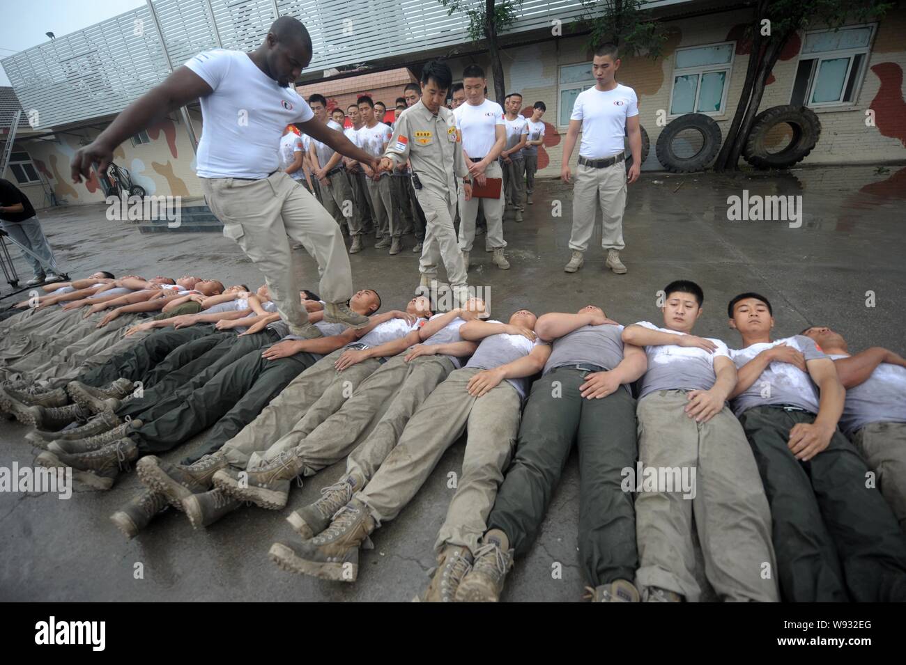 Trainees trample on fellow trainees during a VIP security training ...