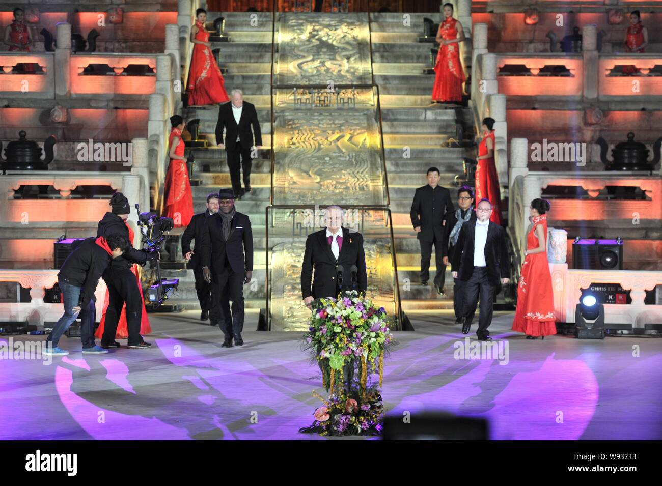 Russian director Nikita Mikhalkov, front center, steps forward on the stage with other directors following the opening ceremony of the 3rd Beijing Int Stock Photo