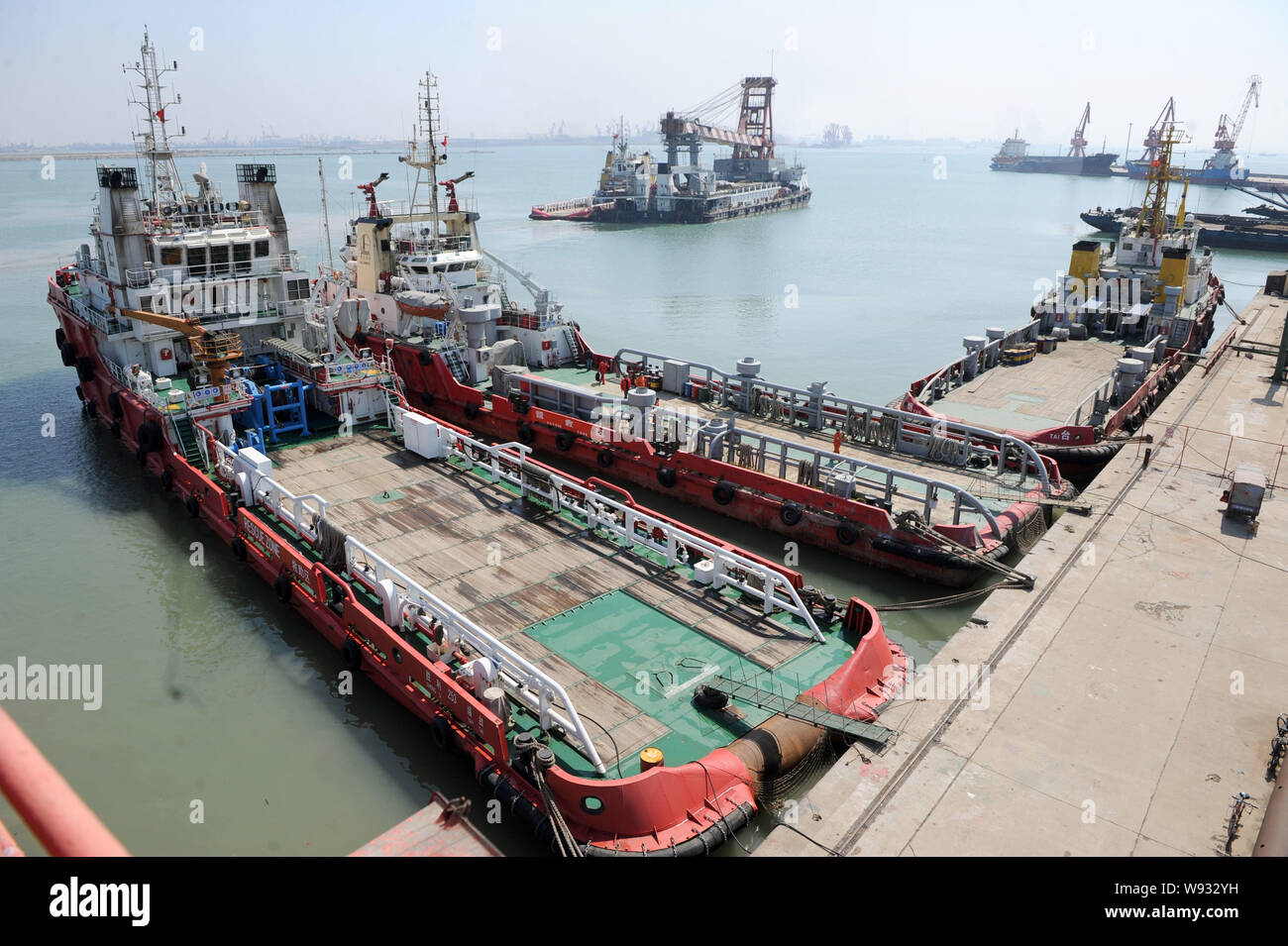 --FILE--Tankers docked at a port at the Shengli oil field in Dongyin, east Chinas Shandong province, 12 April 2013.   China is set to overtake the Uni Stock Photo