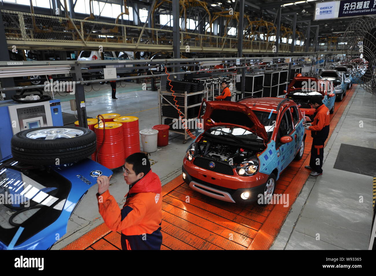 FILEChinese factory workers assemble Panda GX2 cars on the assembly