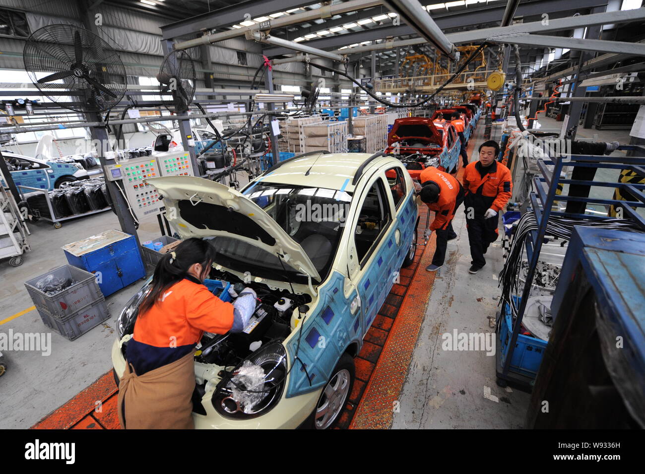 FILEChinese factory workers assemble Panda GX2 cars on the assembly