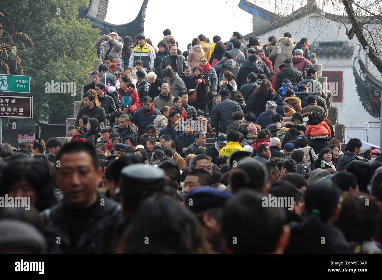 Tourists crowd a bridge in Qibao Ancient Town during the Spring Festival (or the Chinese New Year) holiday in Shanghai, China, 13 February 2013.   Chi Stock Photo