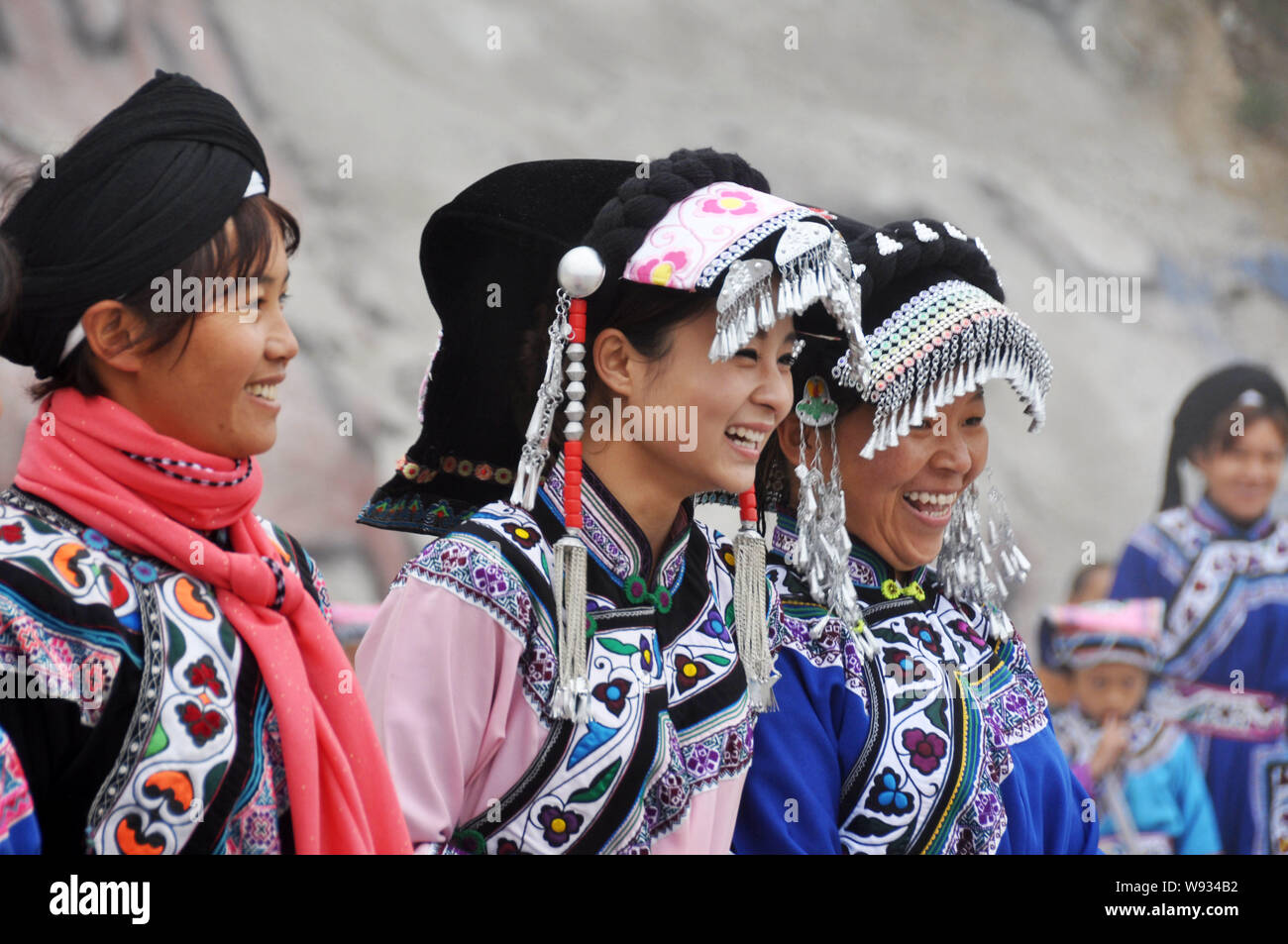 Yi Woman Chinese women of Yi ethnic minority dressed in traditional Yi costumes ...