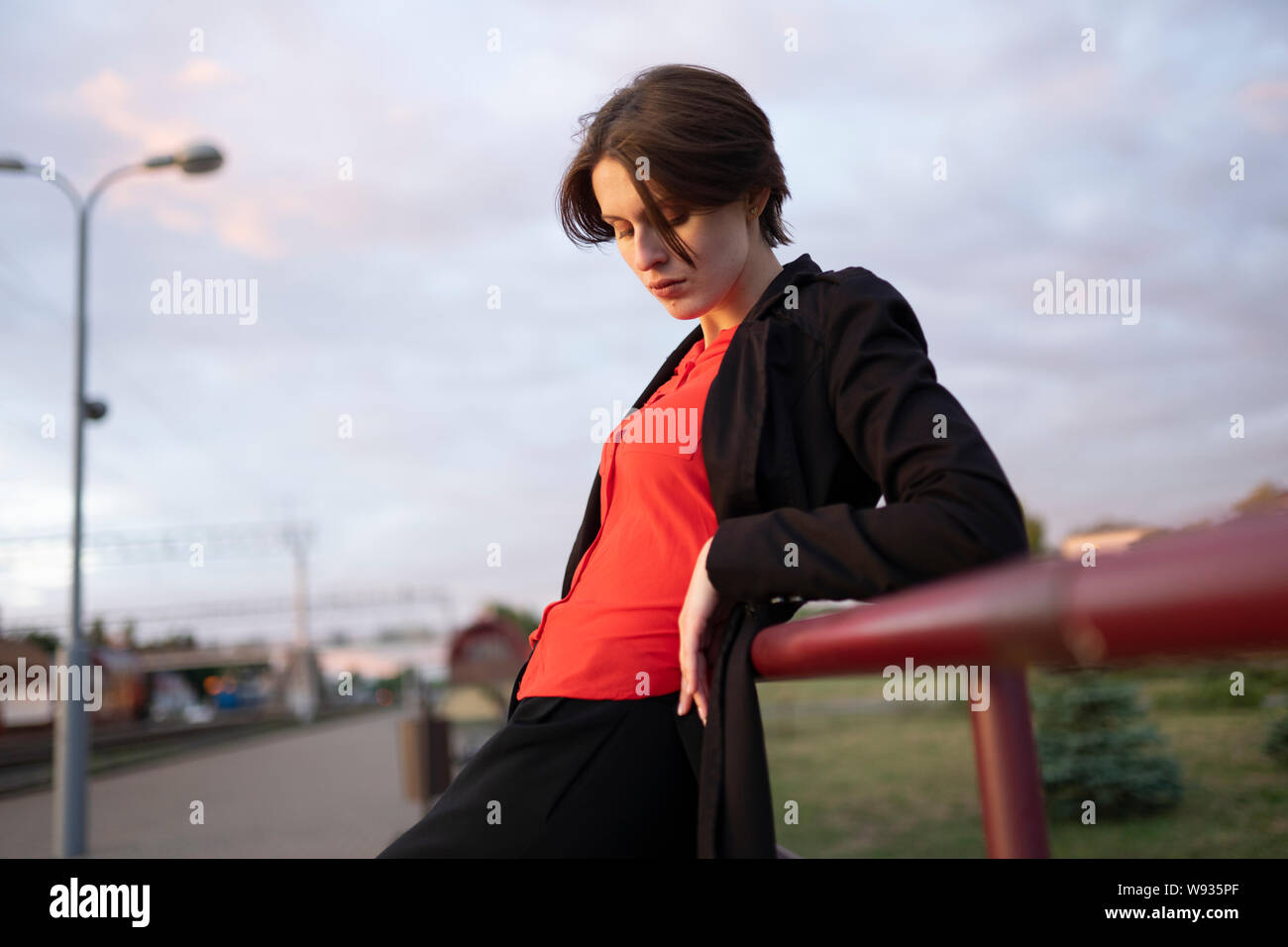 Young woman stands on city hi-res stock photography and images - Alamy