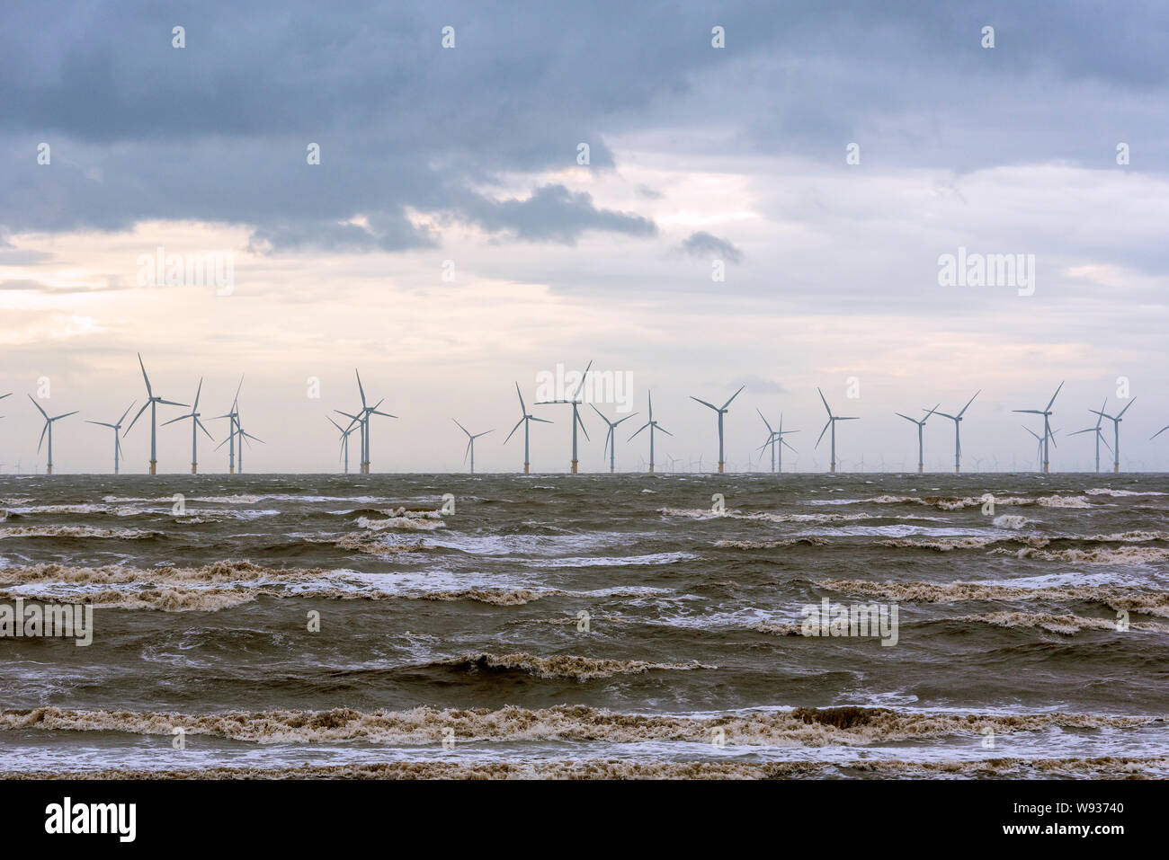Windmills. Windpower. Liverpool Bay offshore windfarm. Clean green electricity. Stock Photo
