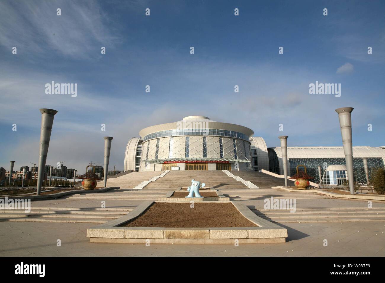 View of the Ordos Convention and Exhibition Center in Kangbashi, known as the Ghost Town in Ordos city, north Chinas Inner Mongolia Autonomous Region, Stock Photo