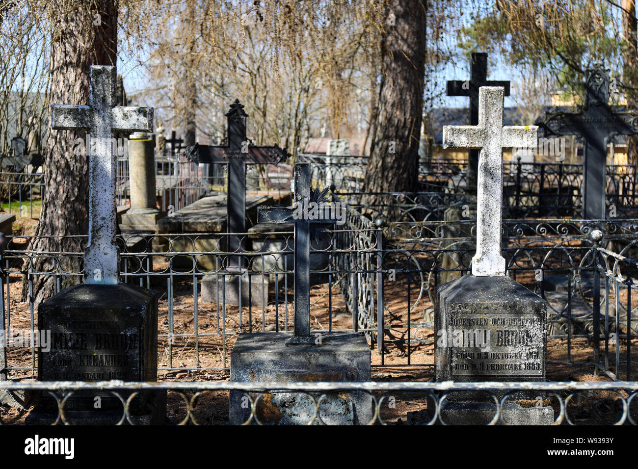 Beautiful old gravestones and cast iron crosses in Hietakylä cemetery in Hamina, Finland Stock Photo