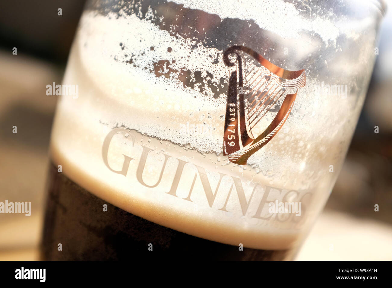 guinness logo on pint glass Stock Photo