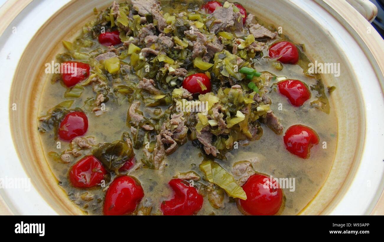 A dish of donkey meat braised with pickled vegetable is pictured in Chenzhou, central Chinas