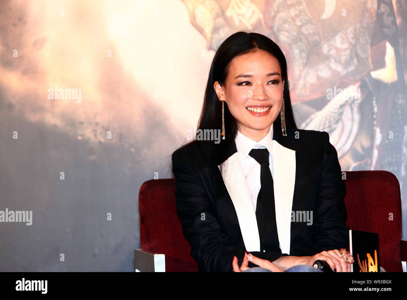 Taiwanese actress Shu Qi smiles during a press conference for the premiere of the movie, Journey to the West: Conquering the Demons, in Beijing, China Stock Photo