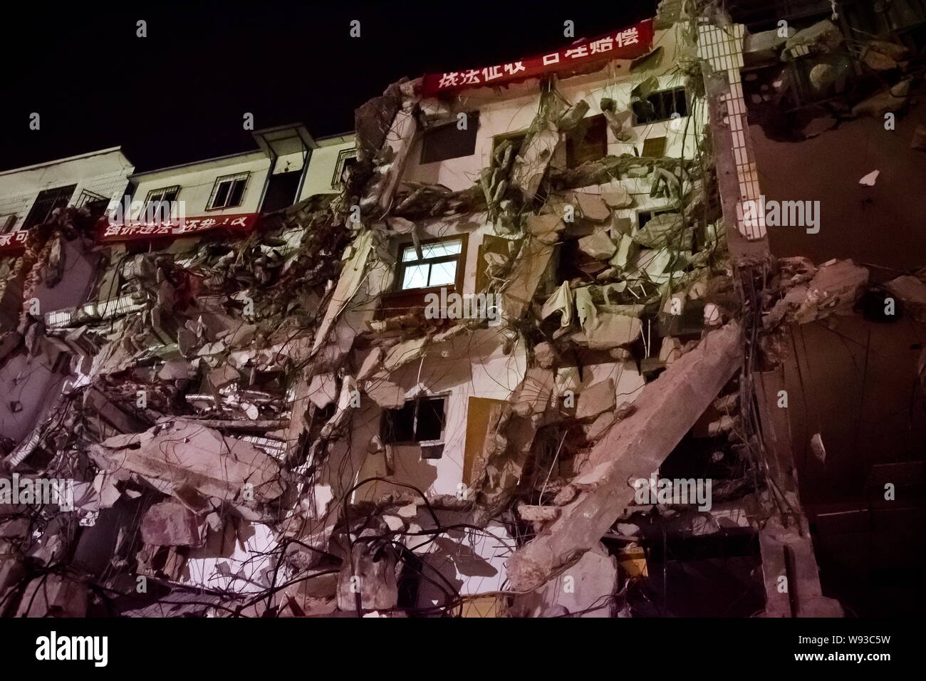 View of the resident buildings, demolished during a forced demolition on March 28, in Nanchang city, south Chinas Jiangxi province, 30 March 2013.   M Stock Photo