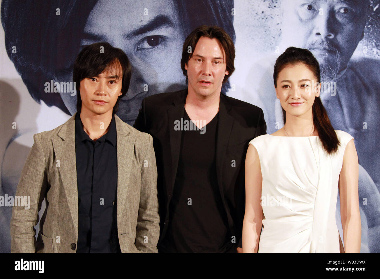 From Left) Chinese Actor Chen Hu, Canadian Actor And Director Keanu Reeves,  And Chinese Actress Ye Qing Pose At A Press Conference For Their New Movi  Stock Photo - Alamy
