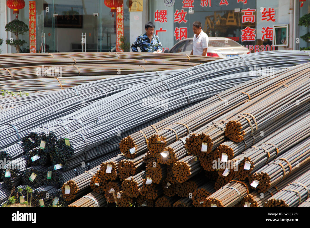 Piles of rebars are seen at a steel products market in Haikou city