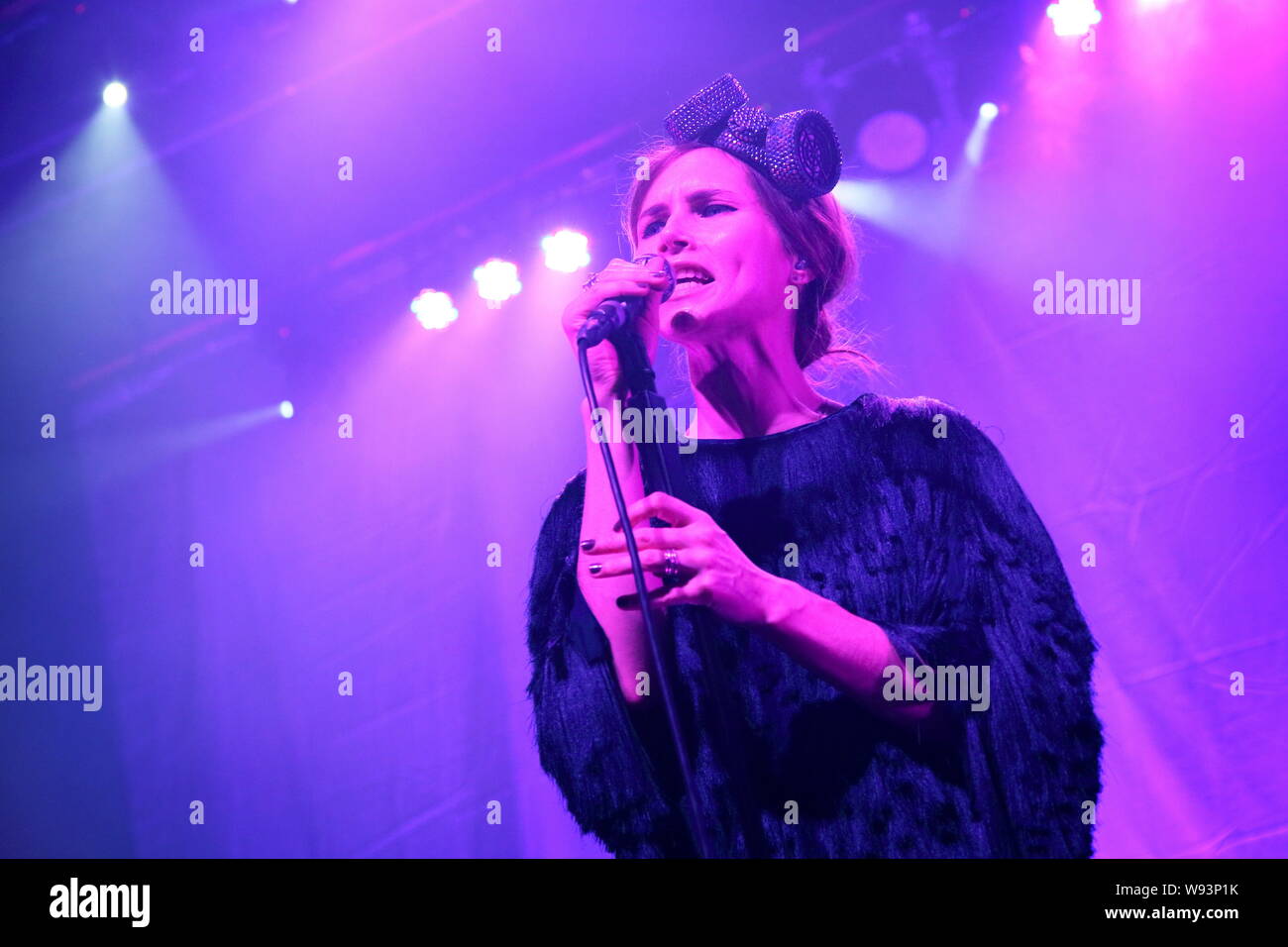 Nina Persson of Swedish rock band The Cardigans performs at their concert in Shanghai, China, 30 November 2013. Stock Photo