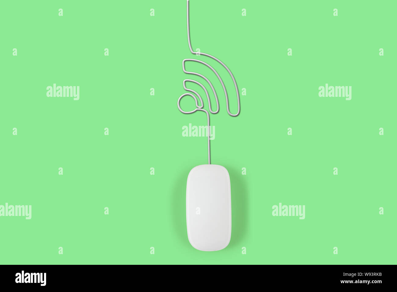 Computer mouse with its wire making wi-fi symbol Stock Photo