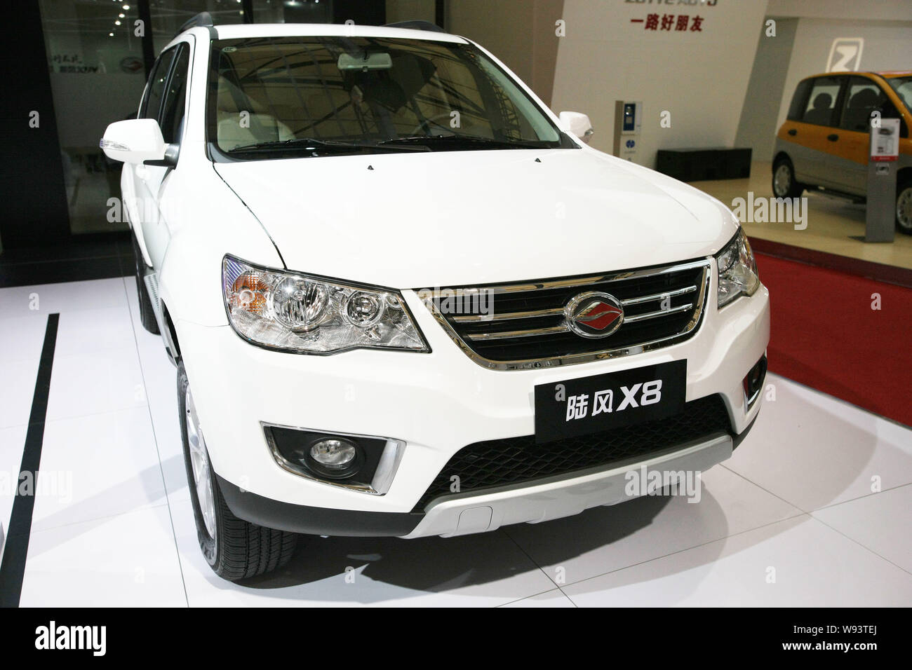A Landwind X8 of Jiangling Motors is displayed during the 15th Shanghai International Automobile Industry Exhibition, known as Auto Shanghai 2013, in Stock Photo