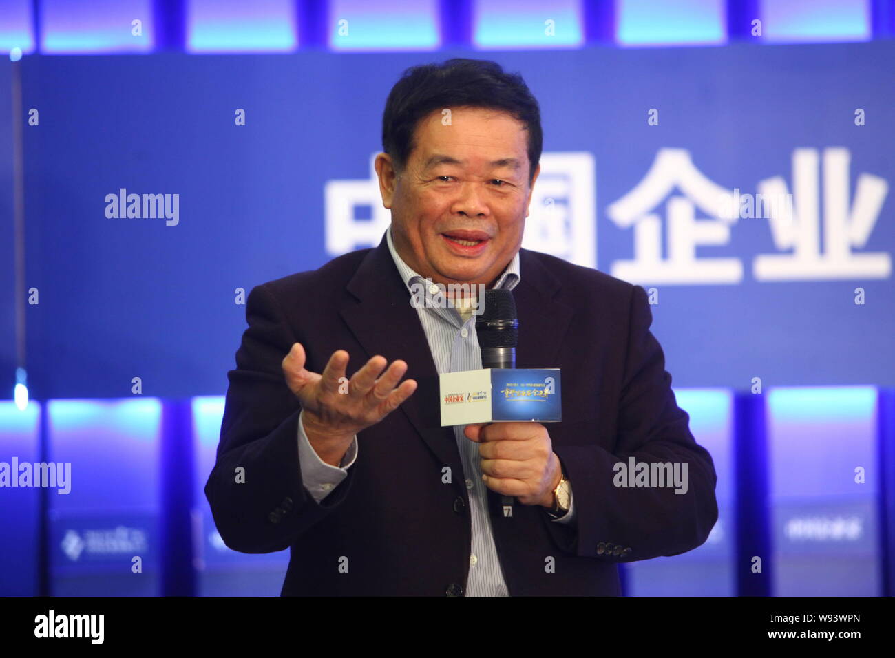 --FILE--Cho Tak Wong (Cao Dewang), Chairman of Fuyao Group and Chairman of Fuyao Glass Industry Group Co., Ltd., speaks during a conference of the 11t Stock Photo