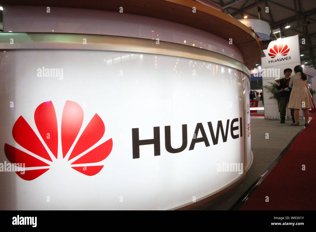 --FILE--People visit the stand of Huawei during the 14th Shanghai Industry Fair in Shanghai, China, 8 November 2012.   For smartphone users in China, Stock Photo