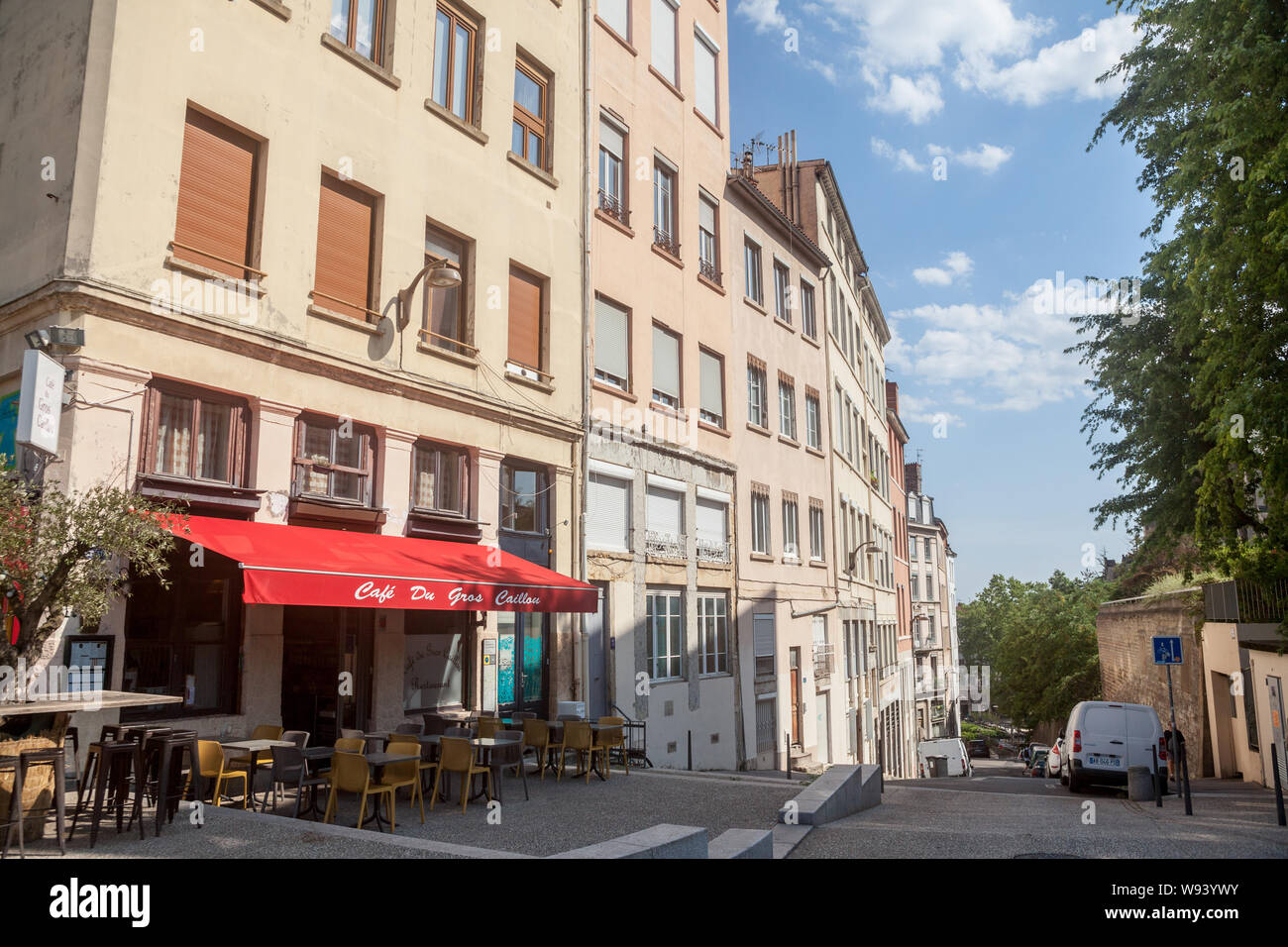 LYON, FRANCE - JULY 17, 2019: Montee Saint Sebastien Street with a traditional cafe , a typical Lyon street with stairs and steps from the colline de Stock Photo