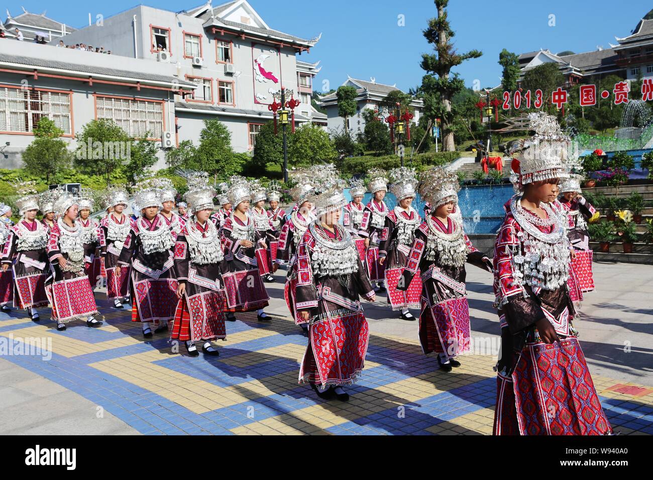 Local Miao people display ethnic costumes during the 2013 Guizhou ...