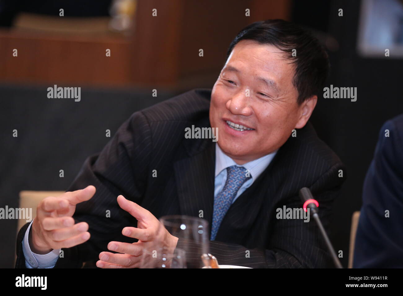 --FILE--Xiao Gang, then chairman of Bank of China (BOC), speaks at a roundtable dialogue in Beijing, China, 26 June 2012.   Four months after taking o Stock Photo