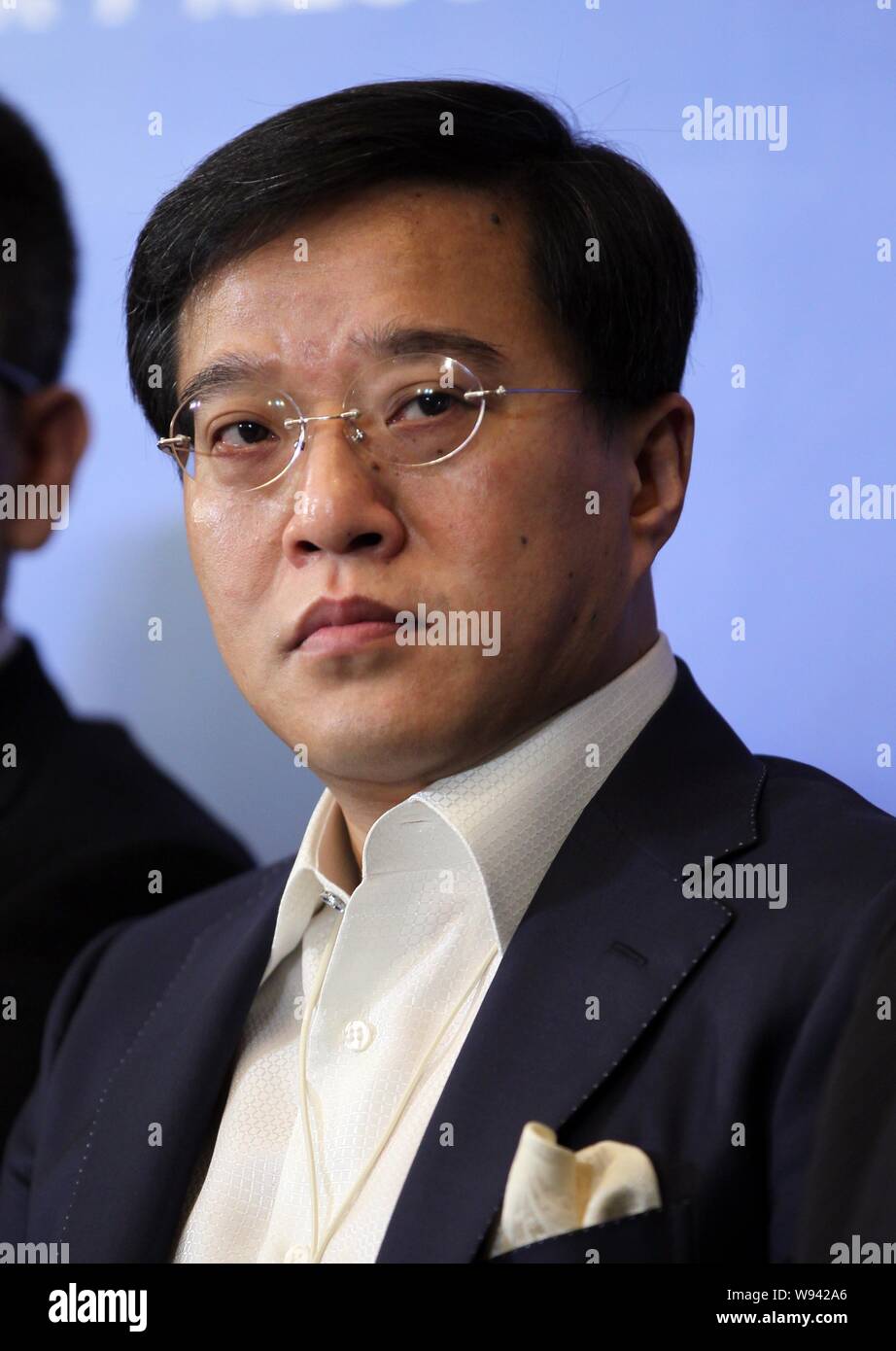 --FILE--Lu Weiding, CEO of Wanxiang Group, attends the 2012 CCTV China Economic Figures award ceremony in Beijing, China, 12 December 2012.    Wanxian Stock Photo