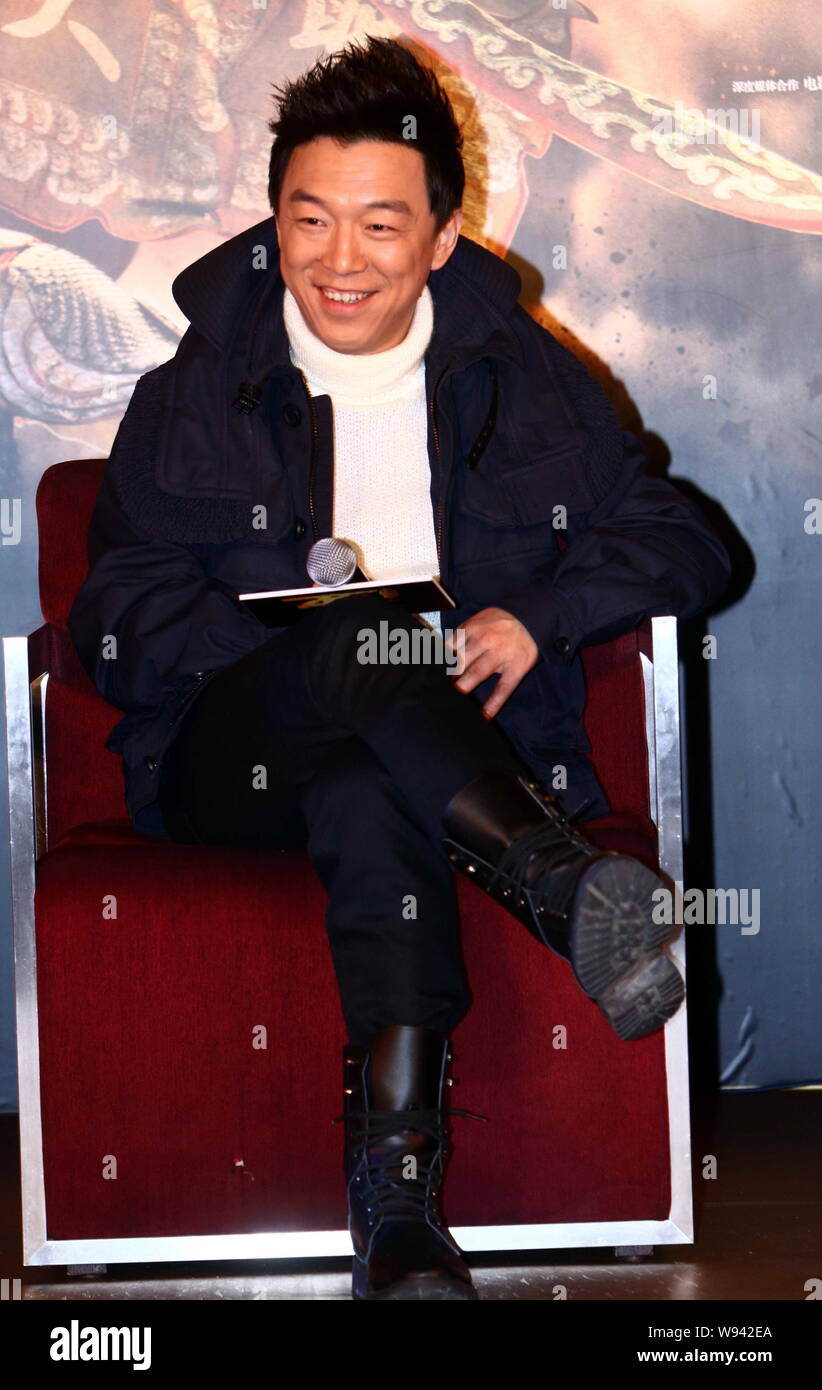 Chinese actor Huang Bo laughes during a press conference for the premiere of the movie, Journey to the West: Conquering the Demons, in Beijing, China, Stock Photo