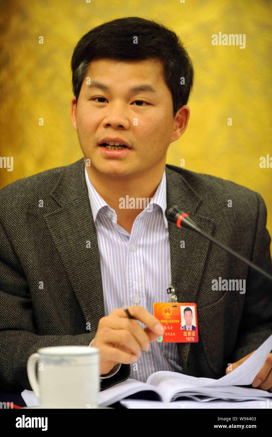 --FILE--Chinese legislator Chen Weicai, personnel director of the Guangzhou Public Security Bureaus political department, speaks in a panel discussion Stock Photo