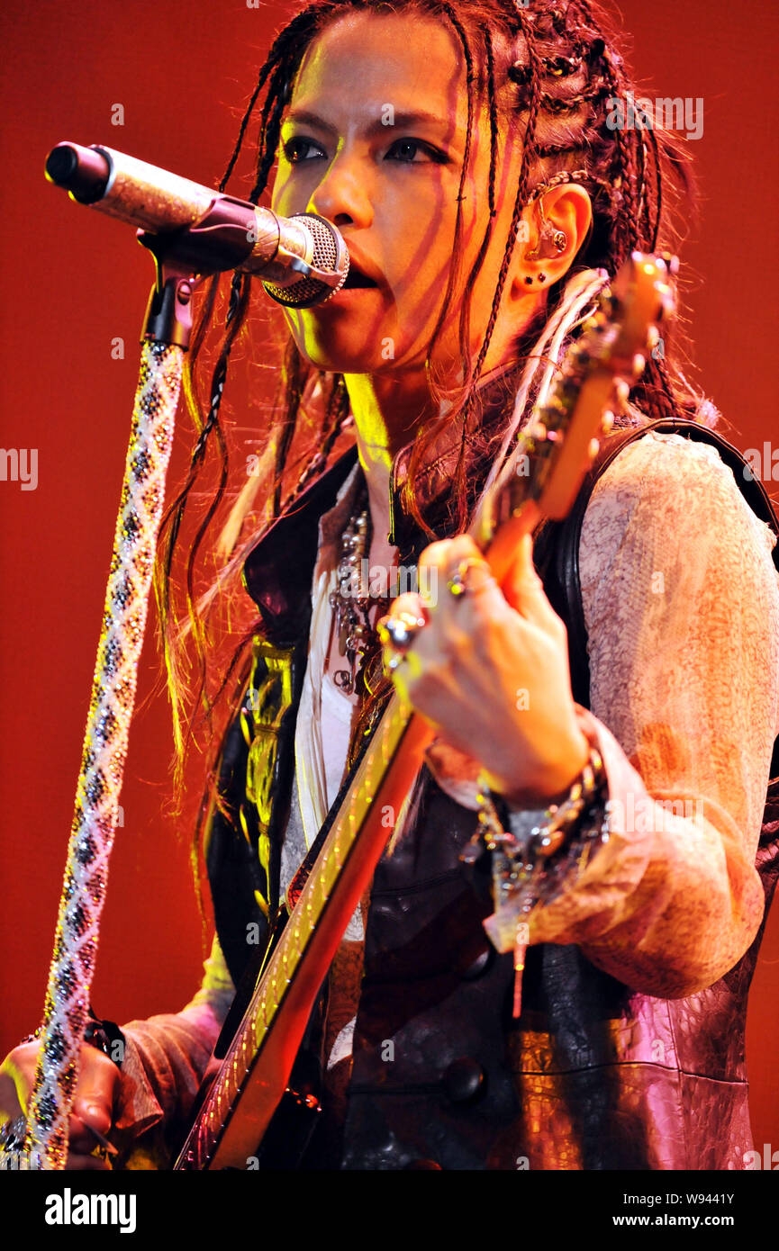 Japanese rock band LArc-en-Ciel performs at a concert during its