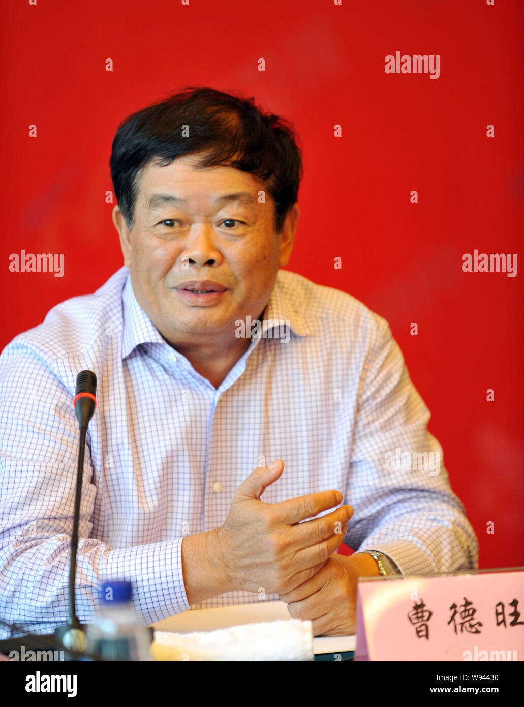 --FILE--Cho Tak Wong (Cao Dewang), Chairman of Fuyao Group and Chairman of Fuyao Glass Industry Group Co., Ltd., speaks during a conference in Xiamen, Stock Photo