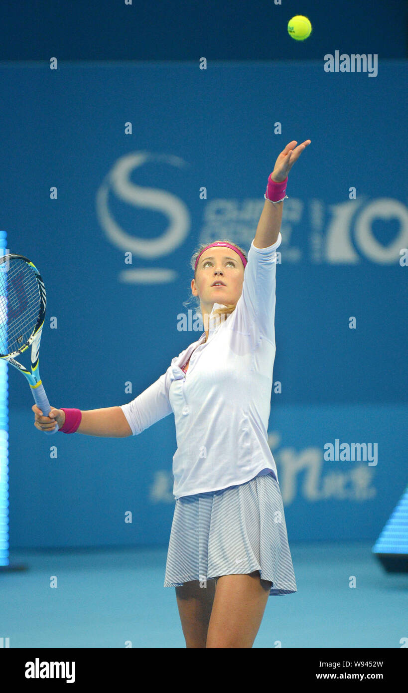 Victoria Azarenka of Belarus a ball against Andrea Petkovic of during their first round Womens Singles match of the 2013 China ten Stock Photo Alamy