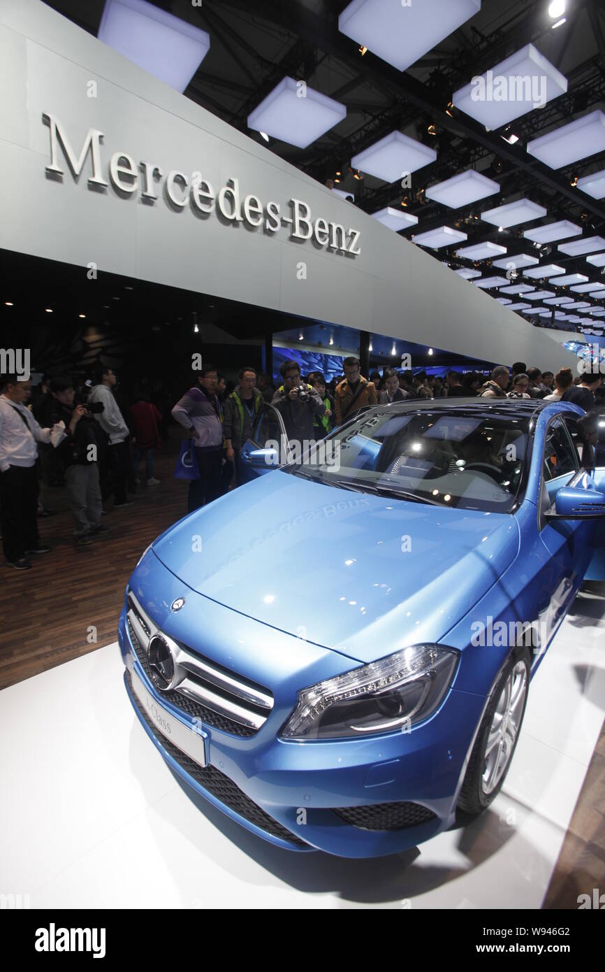 --FILE--Visitors look at a Mercedes-Benz A-Class car during the 15th Shanghai International Automobile Industry Exhibition, known as Auto Shanghai 201 Stock Photo