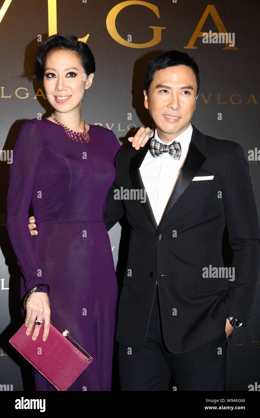 Hong Kong actor Donnie Yen, right, and his model wife Cecilia Wang pose as  they arrive for a party for the re-opening and 10th anniversary of the Bulg  Stock Photo - Alamy