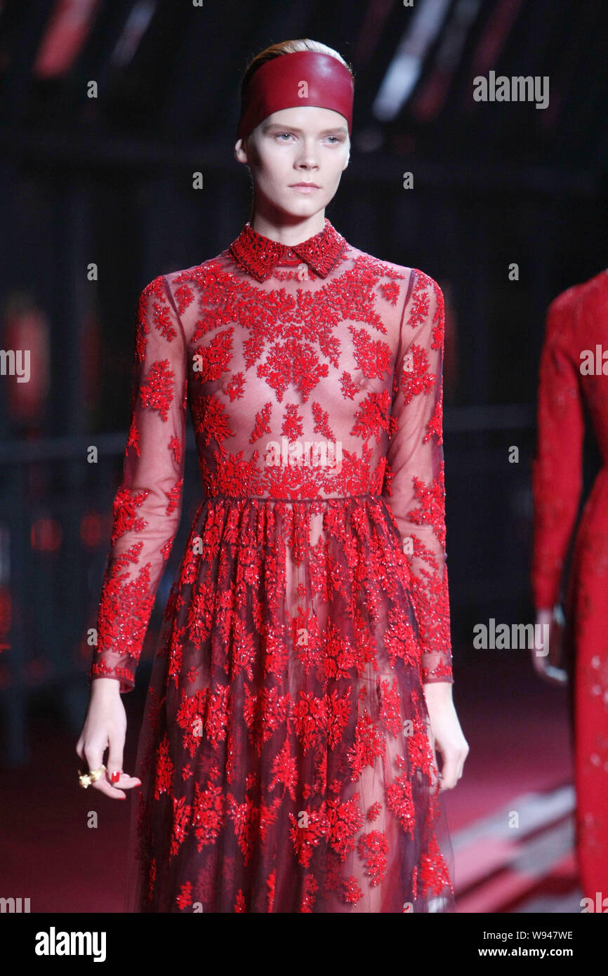 A model displays a new creation from the Valentino Shanghai Collection at a fashion show in Shanghai China 14 November 2013 Stock Photo Alamy