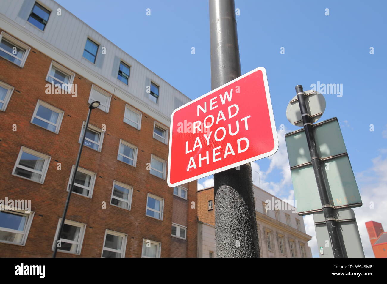 New Road Layout Ahead sign Stock Photo