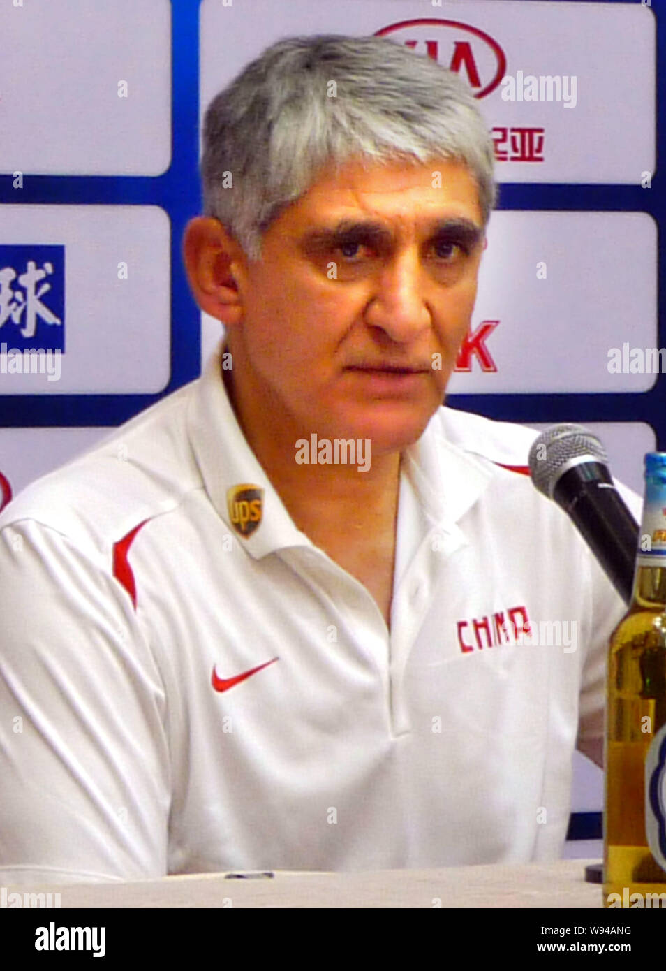 Panagiotis Giannakis,the new head coach of the China mens basketball team, attends a press conference for the Stankovic Continental Cup 2013 in Guangz Stock Photo