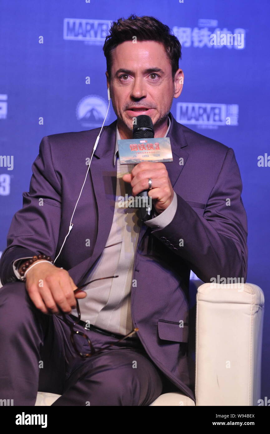 American actor Robert Downey Jr. talks during a press conference for promoting his latest movie, Iron Man 3, in Beijing, China, 6 April 2013. Stock Photo