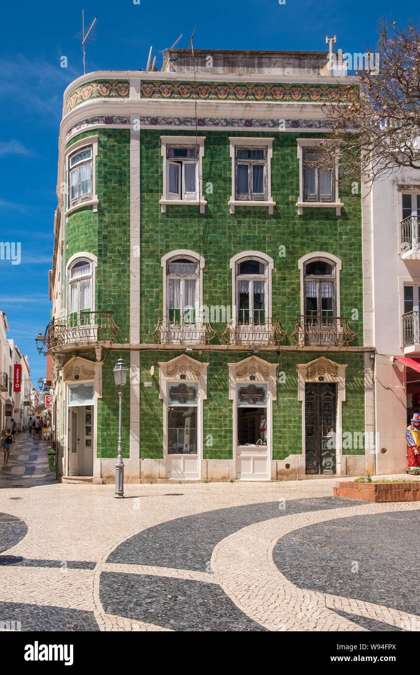 Distinctive green-tiled building in Praca Luis de Camoes in the Algarve town of Lagos in Portugal Stock Photo