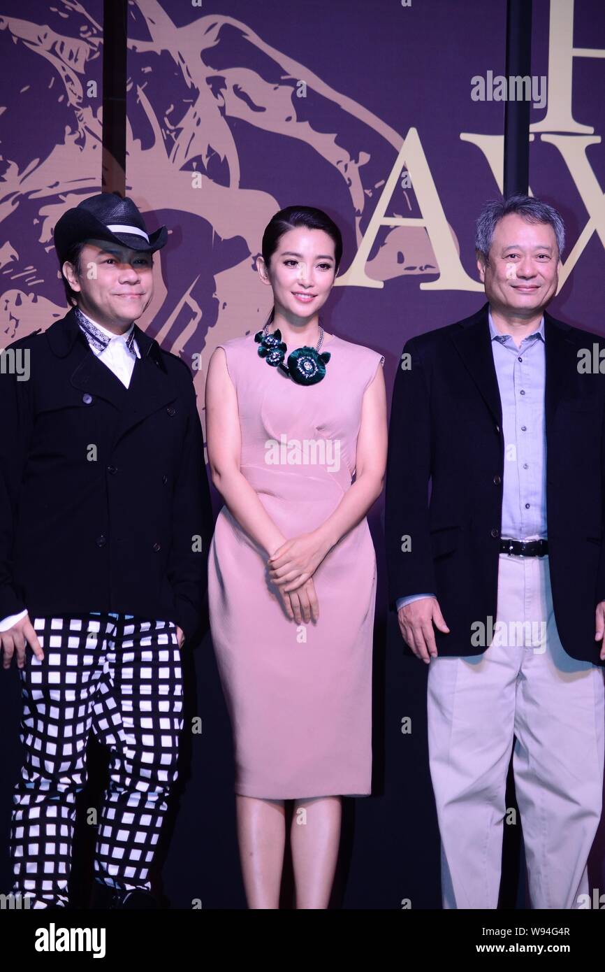 (From left) Taiwanese television host Kevin Tsai, Chinese actress Li Bingbing and Taiwanese director Ang Lee pose during a press conference for the ju Stock Photo