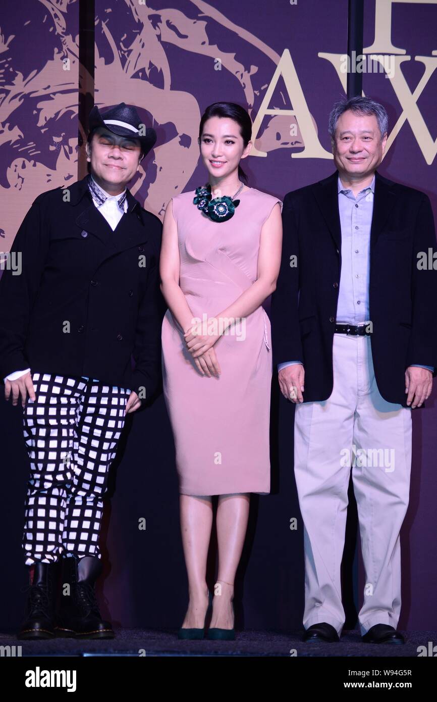 (From left) Taiwanese television host Kevin Tsai, Chinese actress Li Bingbing and Taiwanese director Ang Lee pose during a press conference for the ju Stock Photo