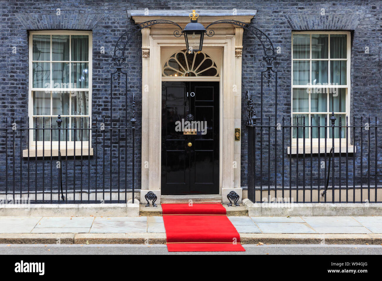 A red carpet is installed outside No 10 Downing Street for a Head of State visit, London, UK Stock Photo