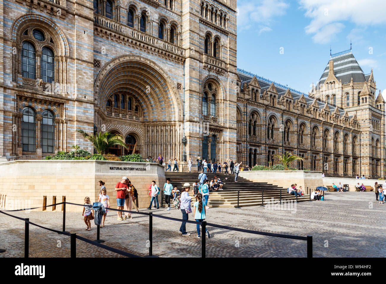 Tourists at the main entrance of the Natural History Museum, from
