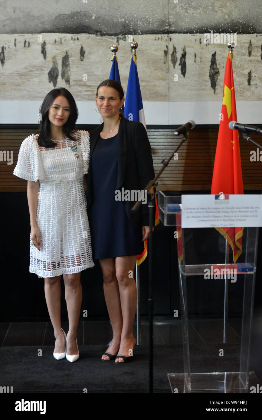 Aurelie Filippetti, right, French Minister of Culture and Communication, poses with Chinese actress Zhang Ziyi at the award ceremony of Ordre des Arts Stock Photo