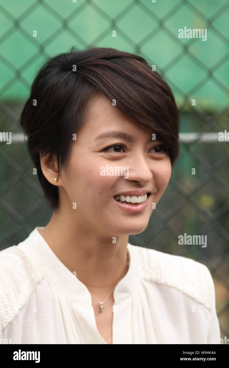 Hong Kong actress and singer GiGi Leung smiles during an activity to spread the message for conservation of black bears in Taipei, Taiwan, 26 January Stock Photo